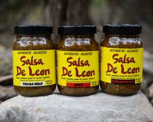 Three Jars of Salsa on a rock